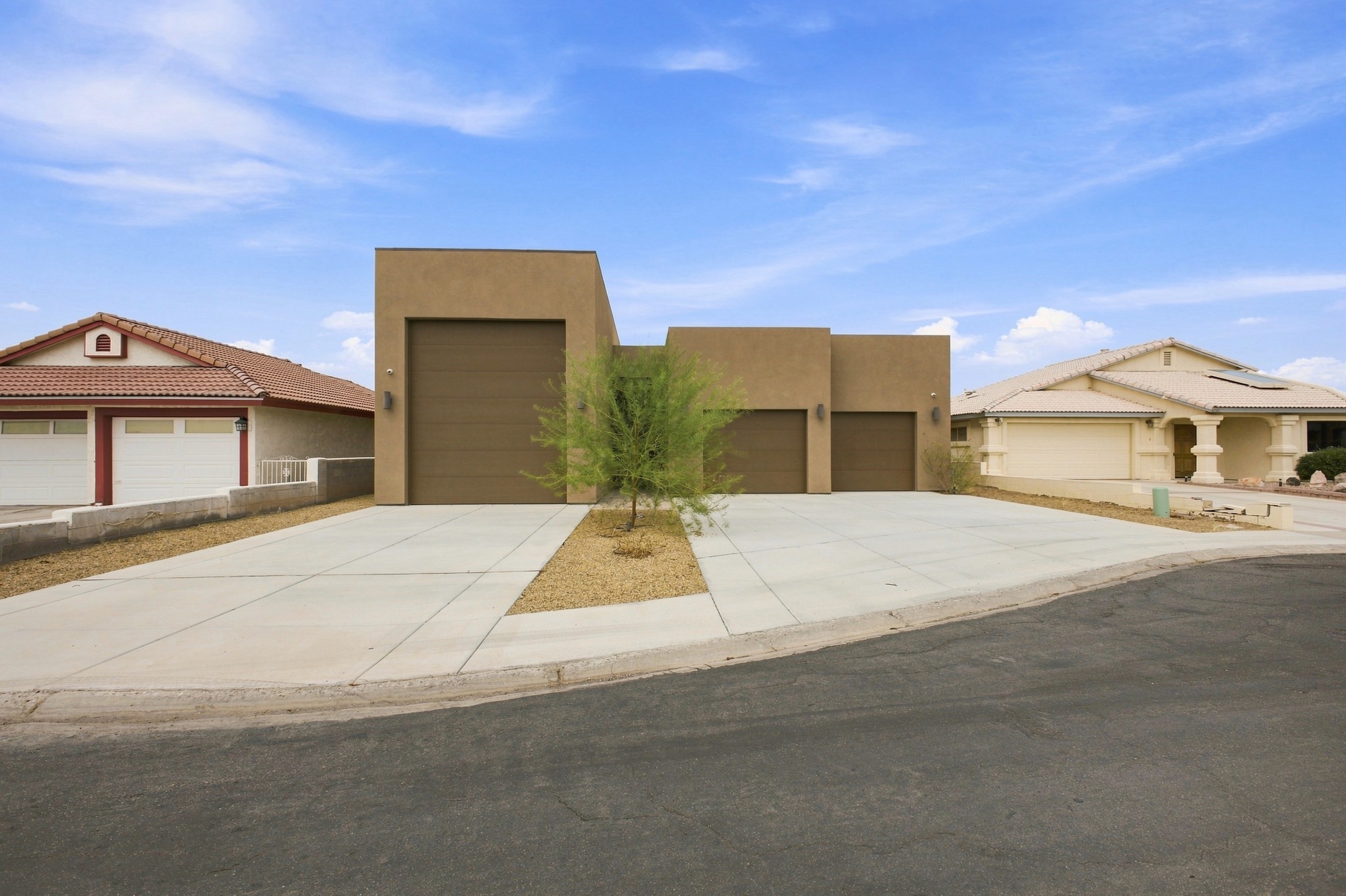 Professional exterior photo of a modern desert home