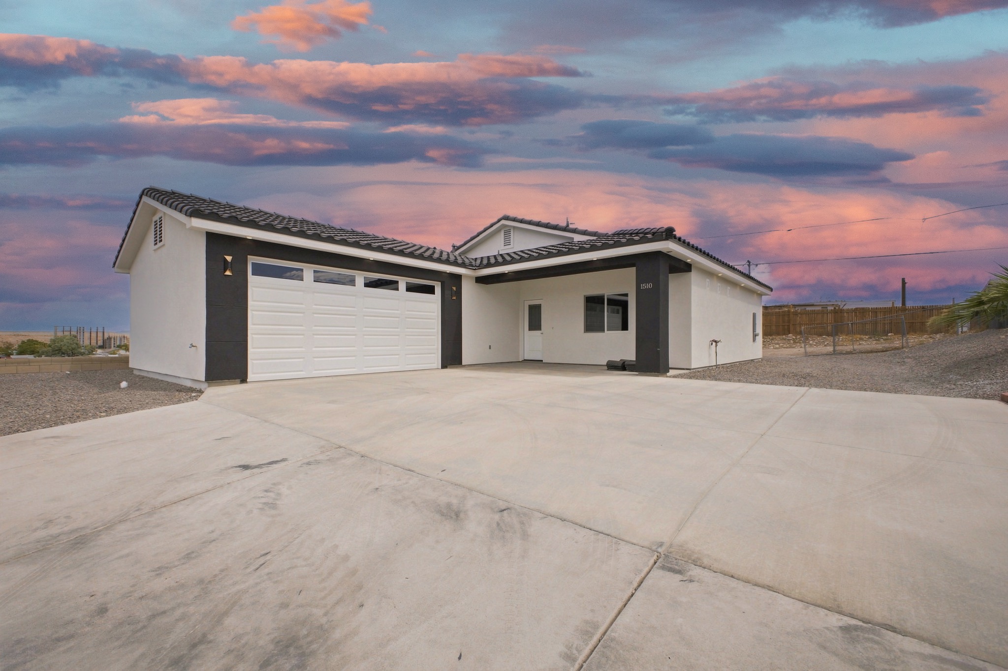 Twilight exterior real estate photograph of a modern home